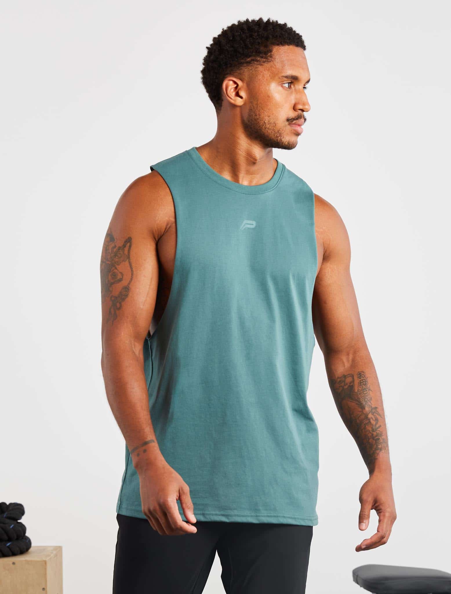 Icon Drop Arm Tank / Teal Pursue Fitness 1