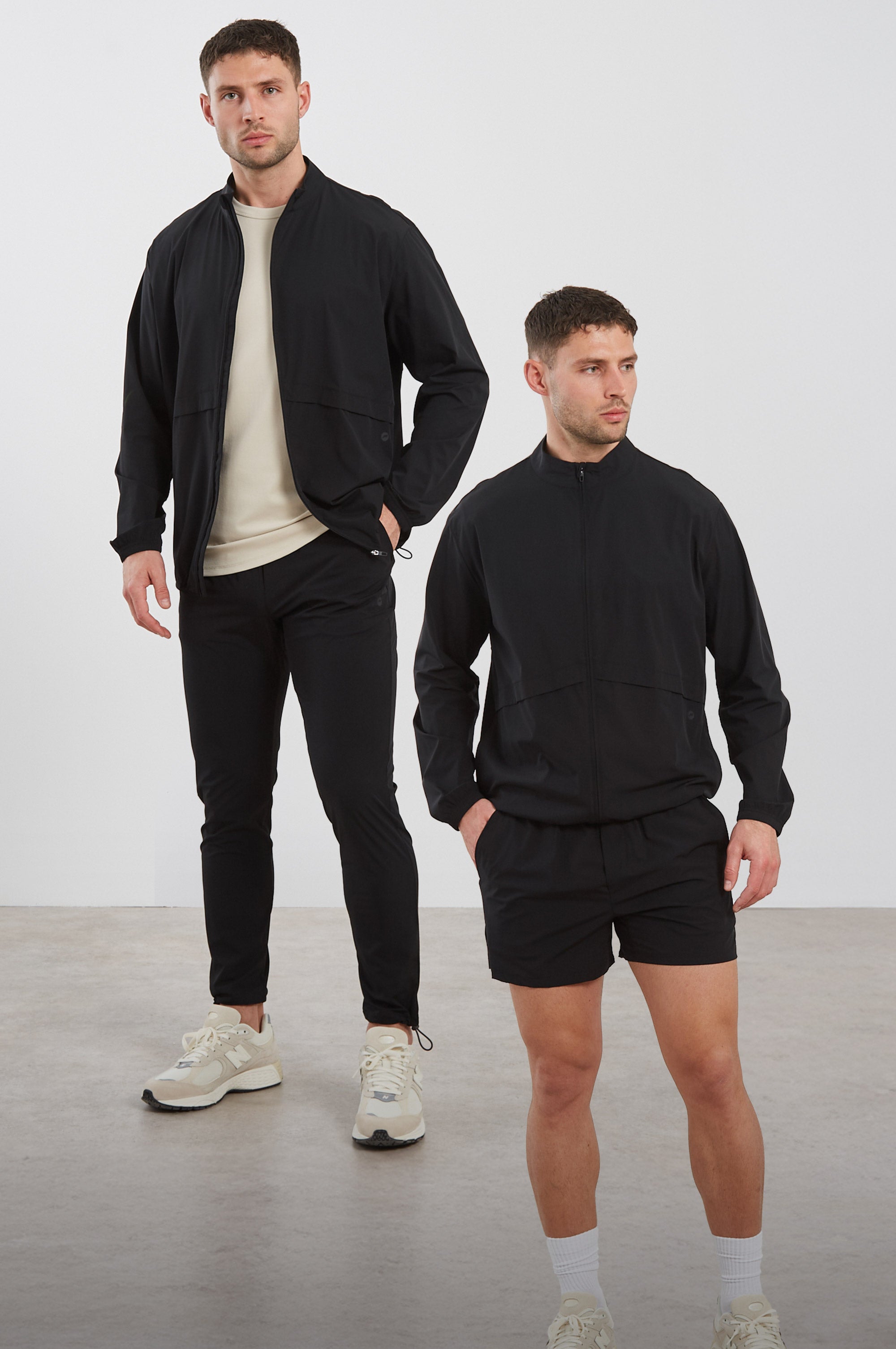 Man wearing black performance joggers from the Fundamental Collection