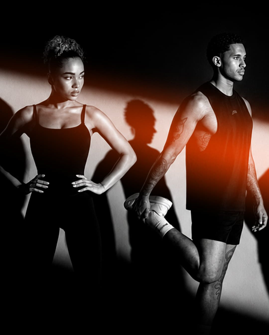Pursue Fitness models wearing men's and women's gym wear for Black Friday 2026
