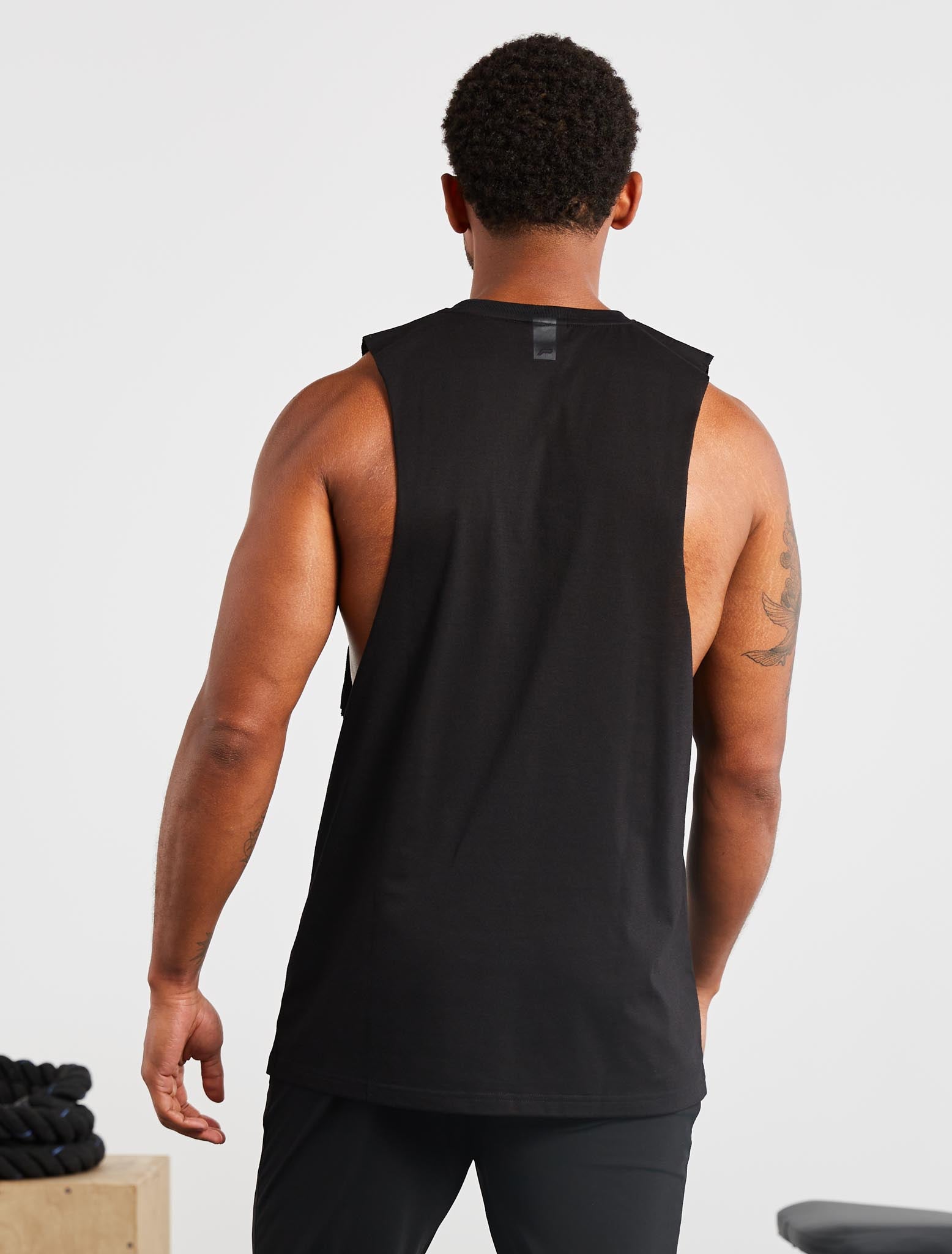 Graphic Drop Arm Tank | Black | Pursue Fitness