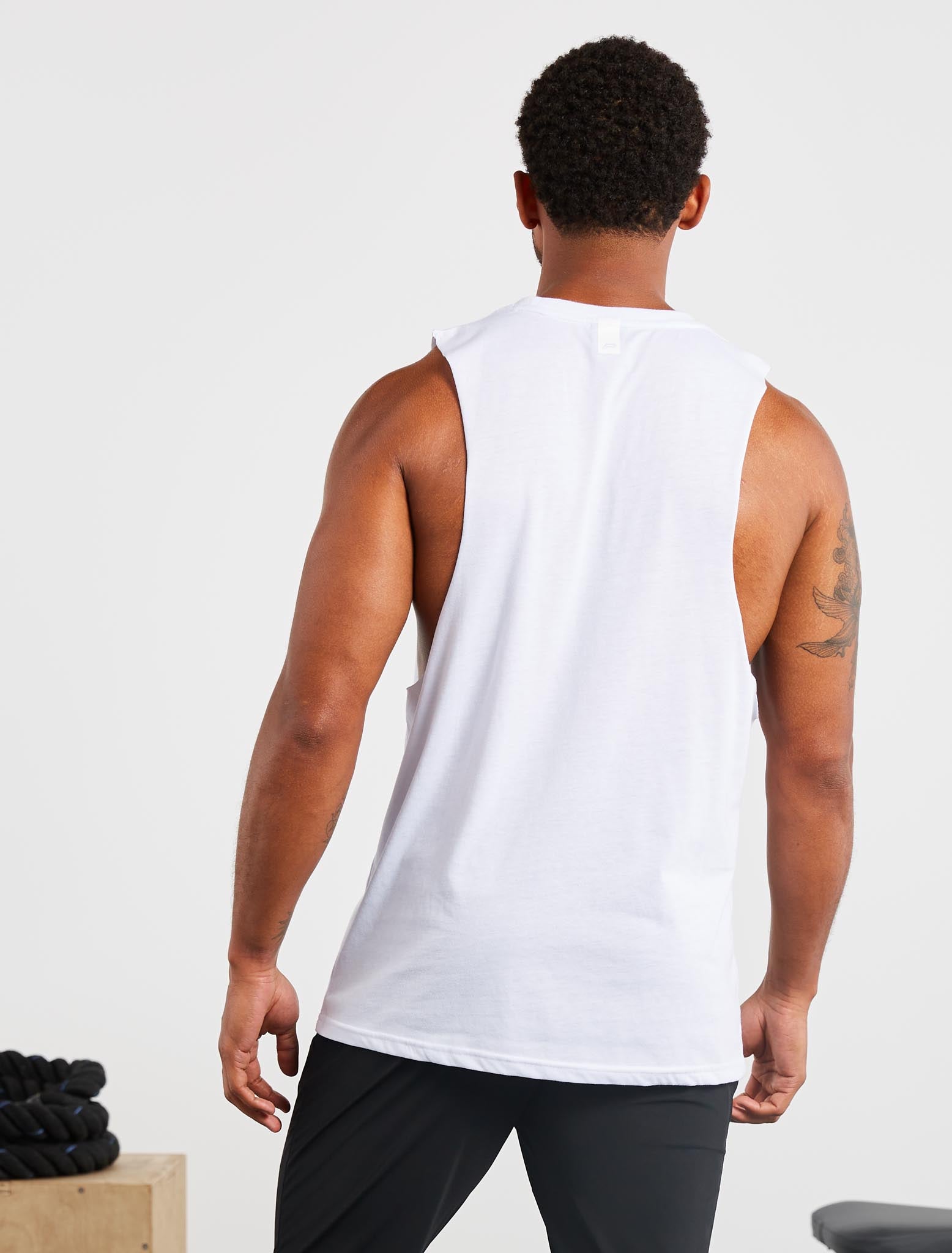 Graphic Drop Arm Tank | White | Pursue Fitness