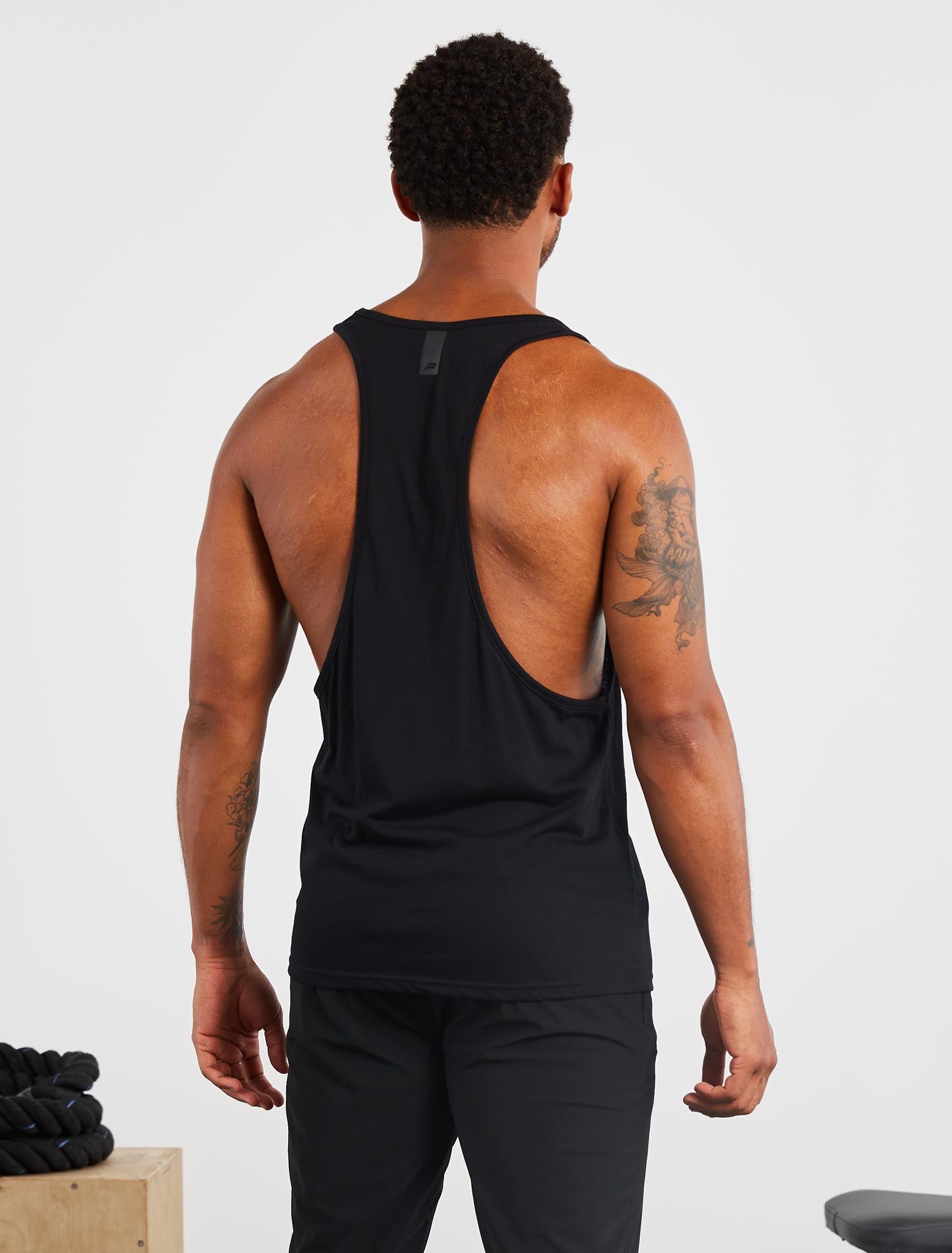 Stringer Vest Polyester Graphic Stringer Vest | Black | Pursue Fitness