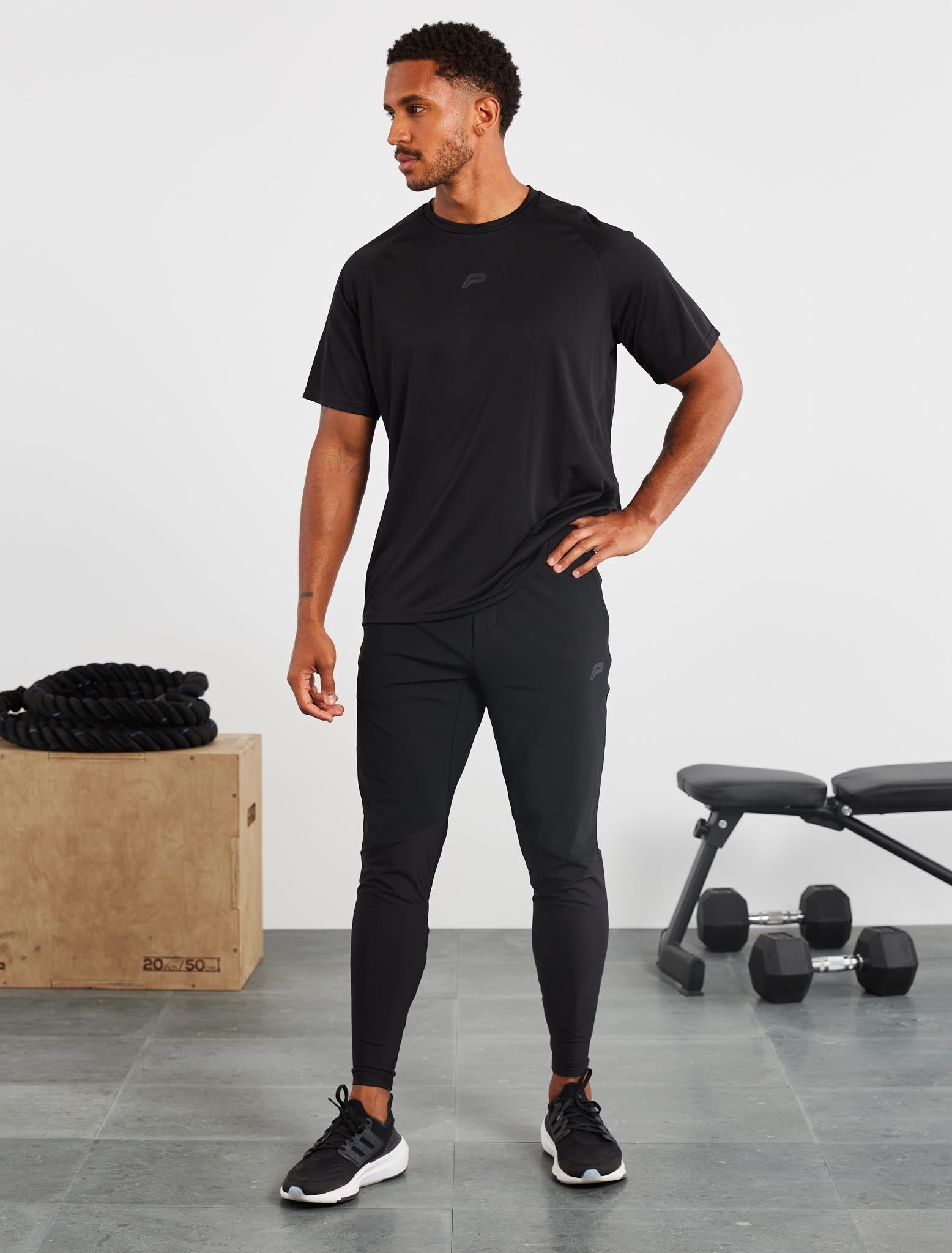 https://www.pursuefitness.com/cdn/shop/files/relaxed-fit-training-t-shirt-black-mens-6.jpg?v=1691626436