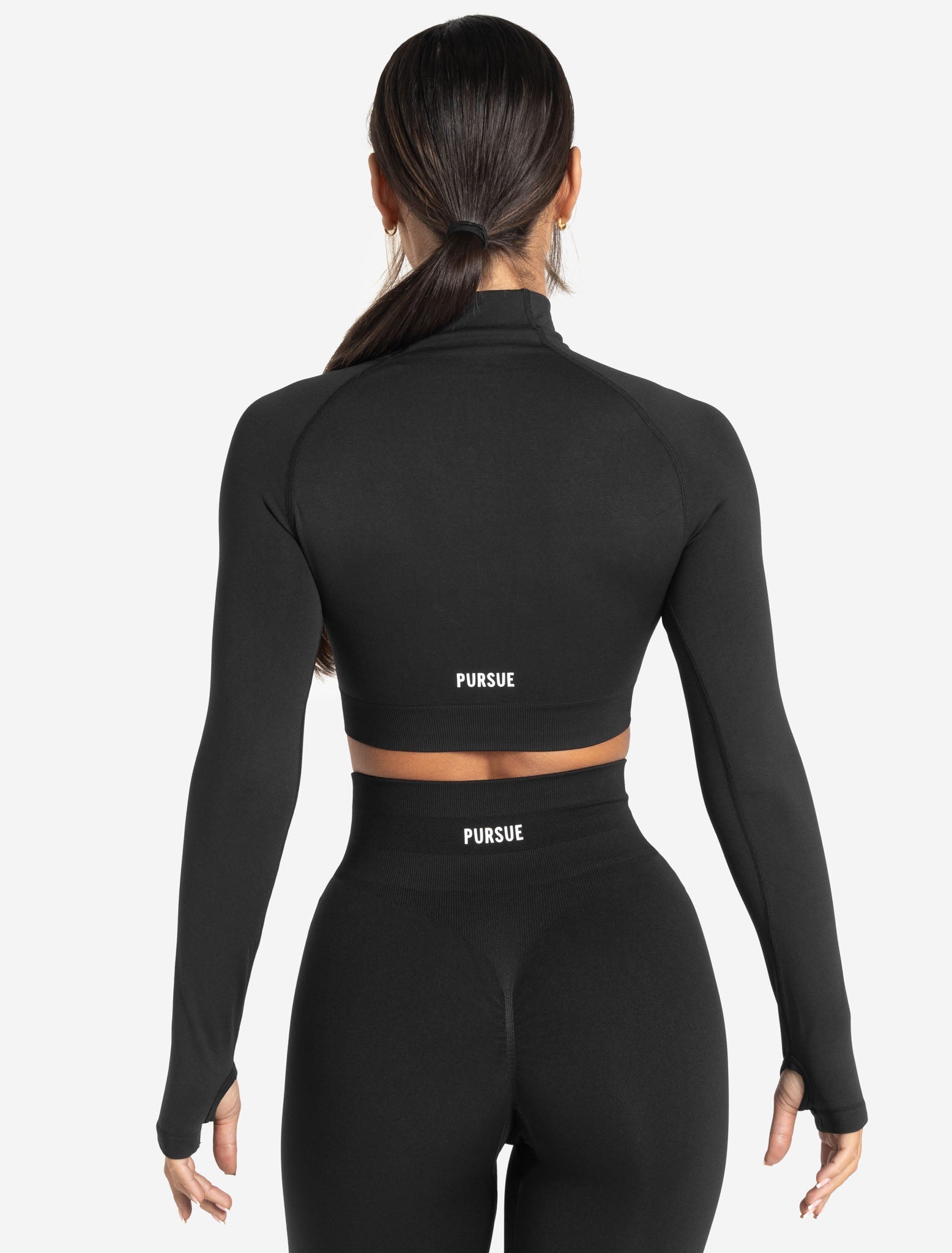 https://www.pursuefitness.com/cdn/shop/files/scrunch-seamless-crop-12-zip-black-womens-5.jpg?v=1691626330